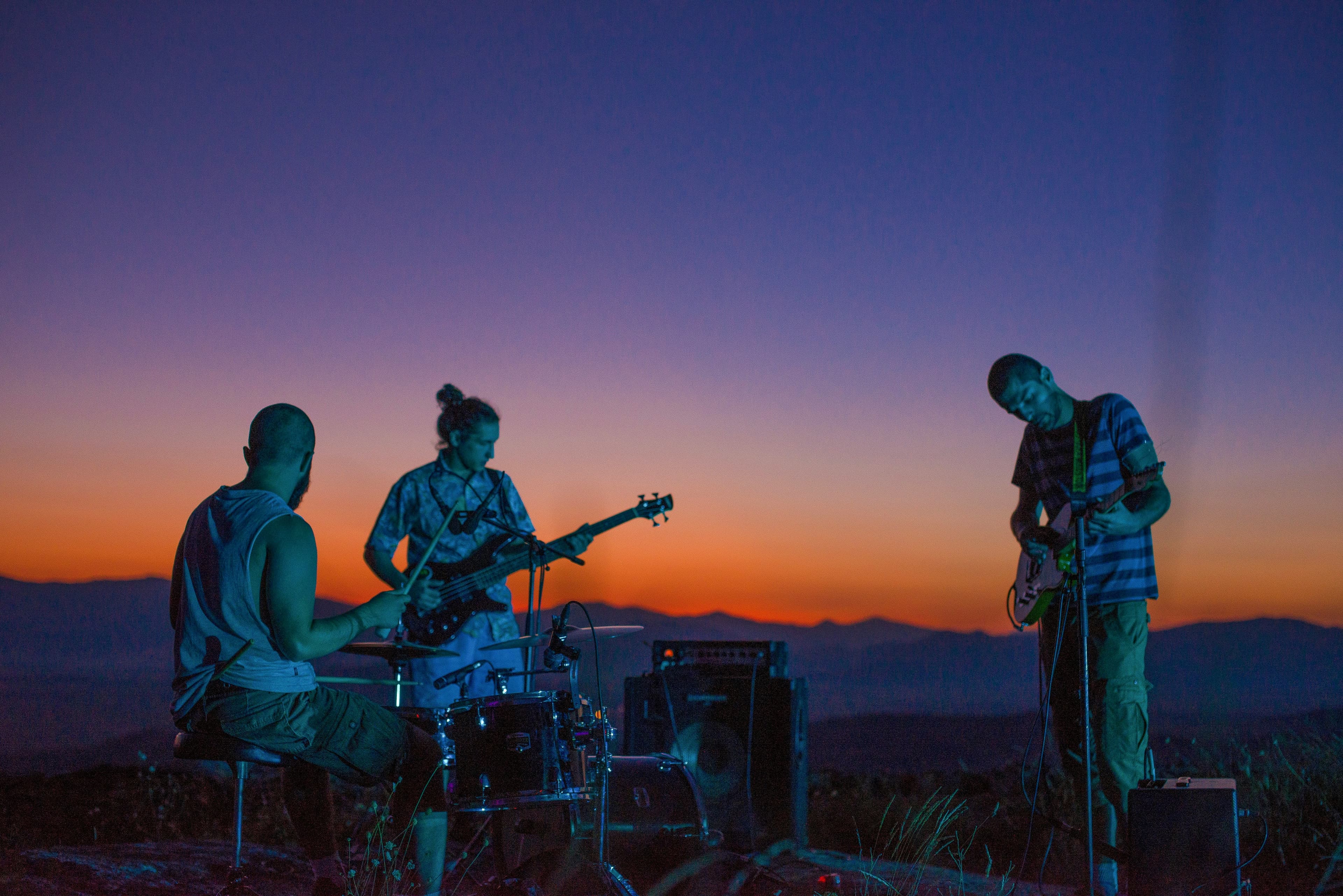 Artists performing at sunset